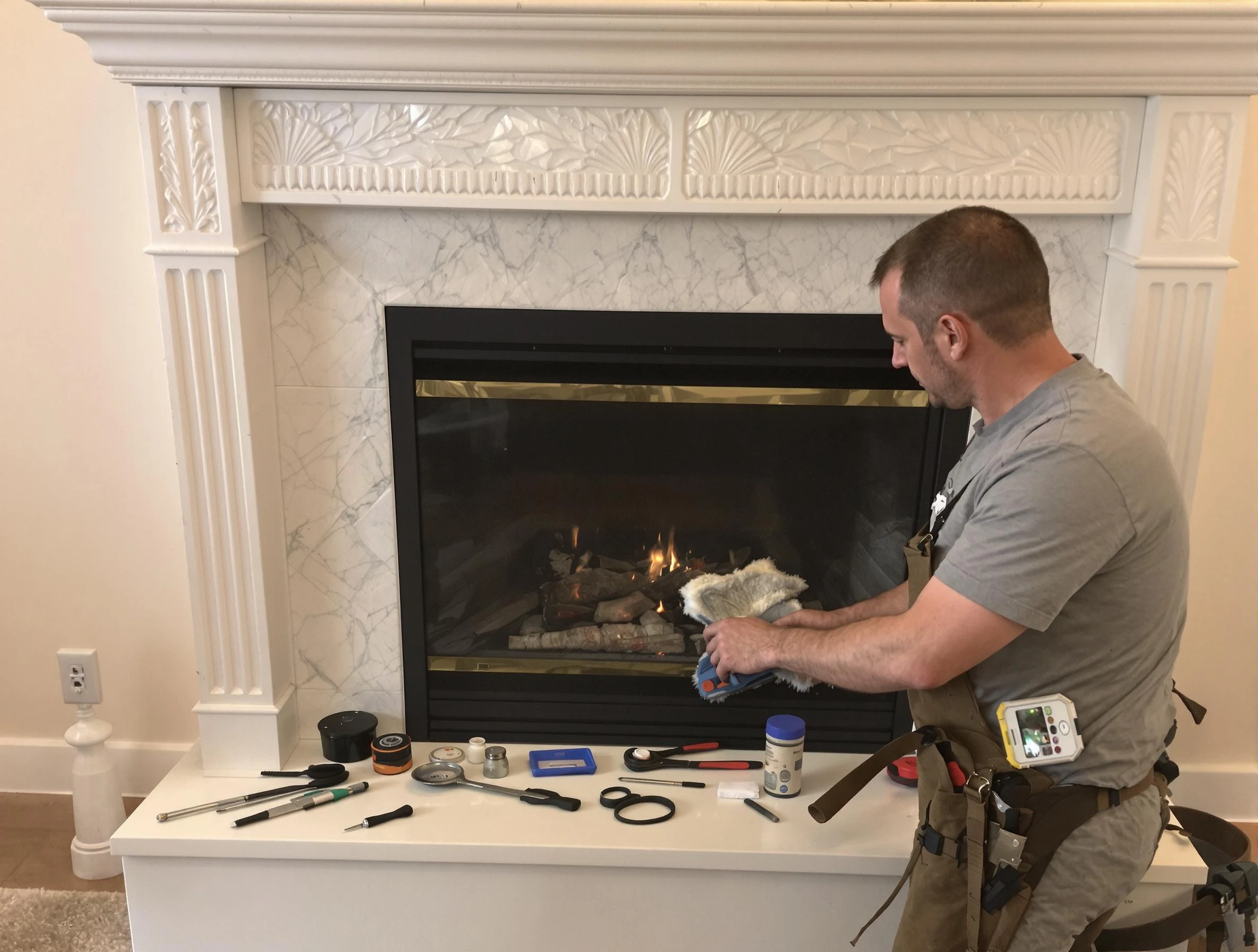 Shrewsbury Chimney Sweep performing fireplace maintenance in Shrewsbury, MA